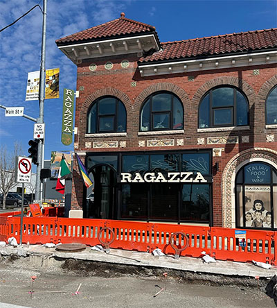 Exterior of Ragazza shown with KC Streetcar construction in foreground.